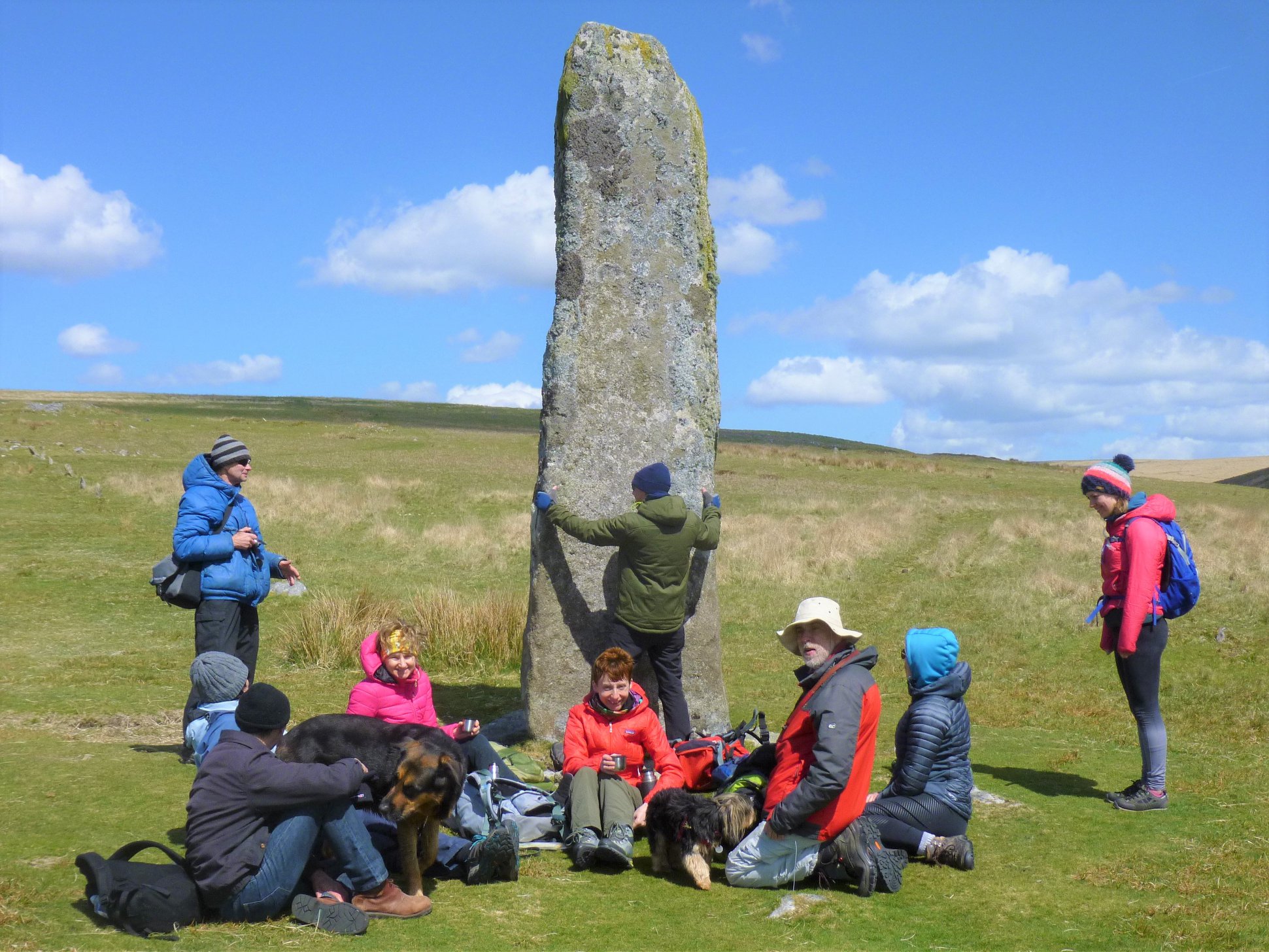 A club member attempting to re-arrange the scenery on a club trip to Dartmoor.